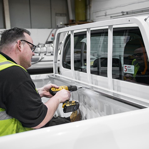 Fitter Drilling in the Truck Bed